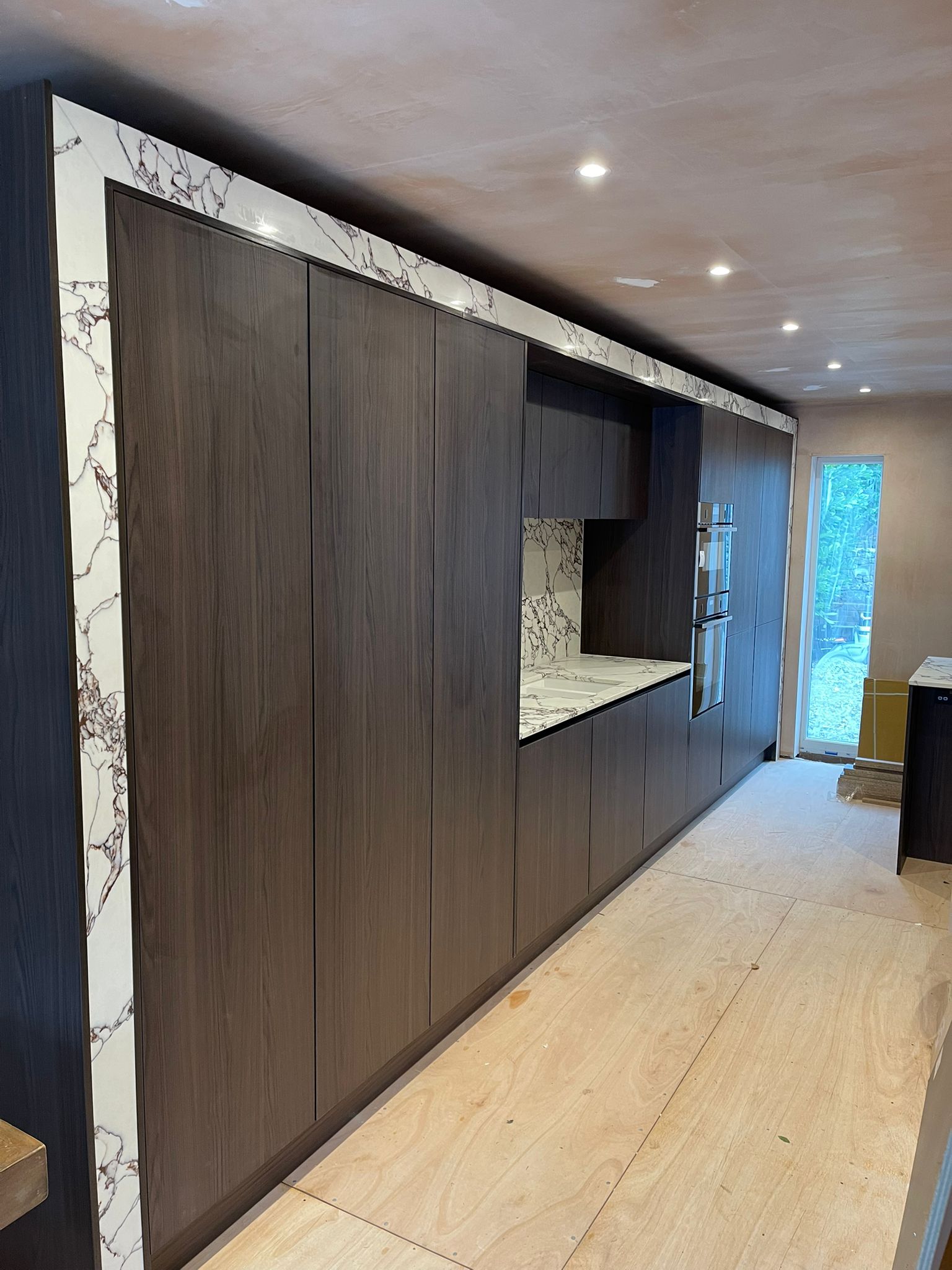 The Valley — Quartz 20mm Rosa Bulgari — Cheshire installation